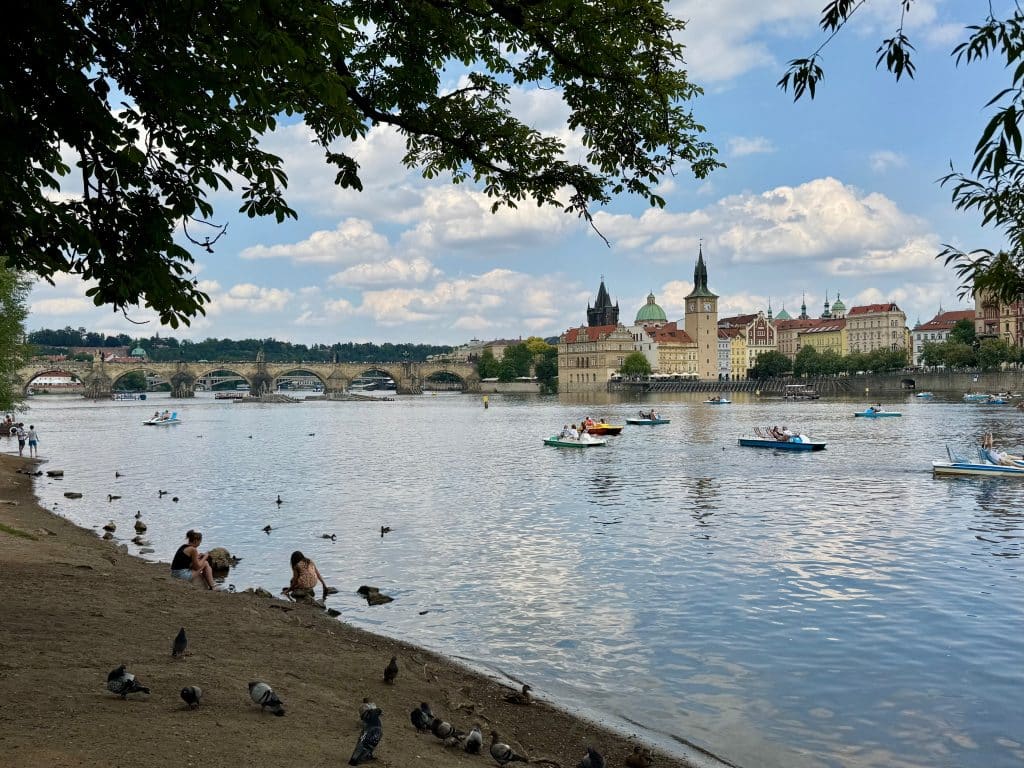 A few of Prague's old town from a little island in the river. You see church steeples poking out on the other side of the river.