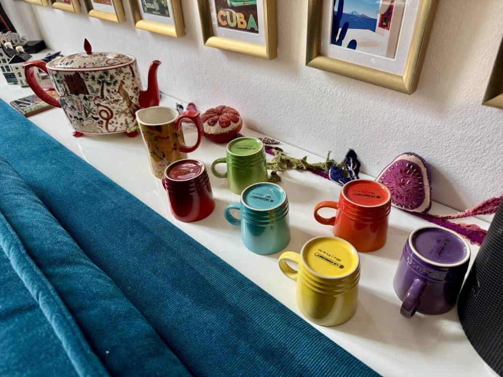 A set of six espresso cups in a rainbow of colors.