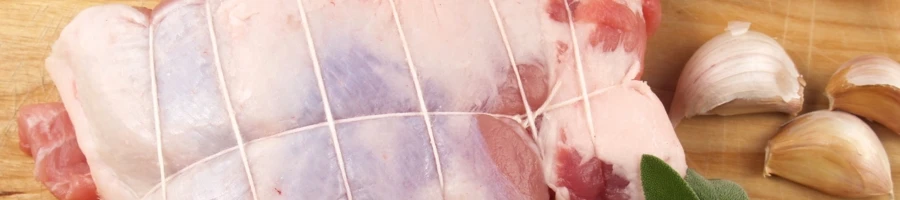 A close up shot of a raw pork shoulder