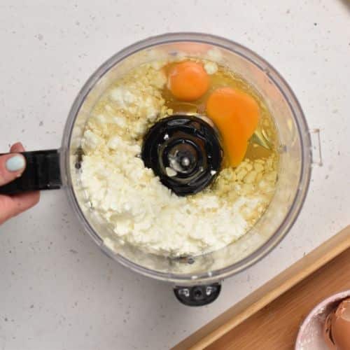 Liquid Flourless Protein Cake ingredients in a food processor.