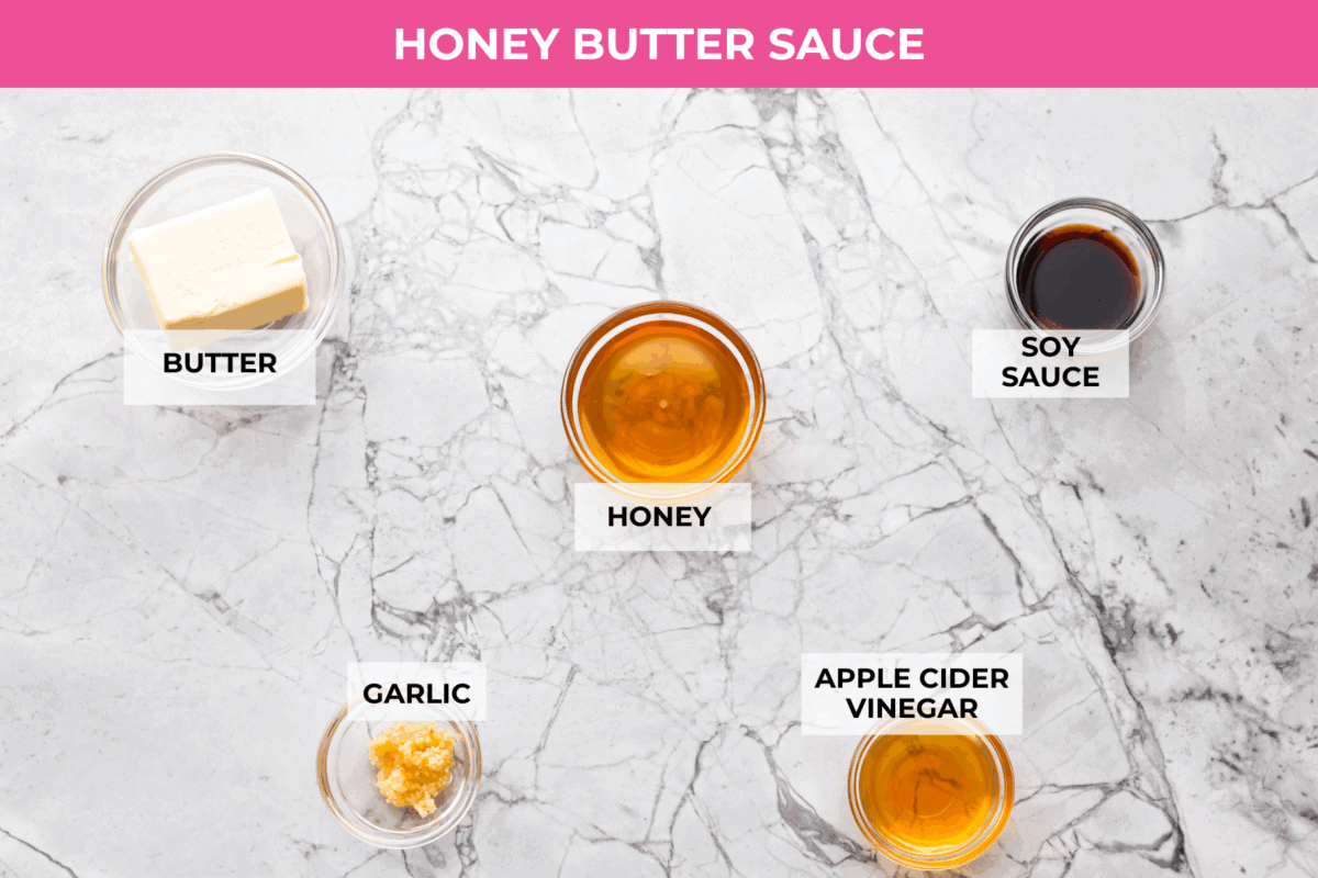Overhead shot of labeled honey butter chicken sauce ingredients. 