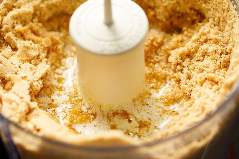 Crushed biscuits and butter mixture.