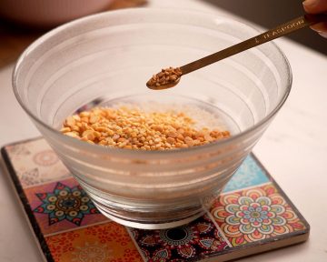 adding methi seeds
