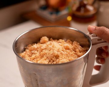 add jaggery, coconut, cardamom - kandarappam