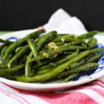 easy garlic roasted green beans with lemon mustard dressing