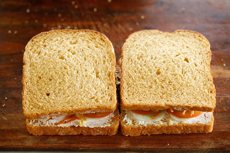 Buttered bread placed on top.