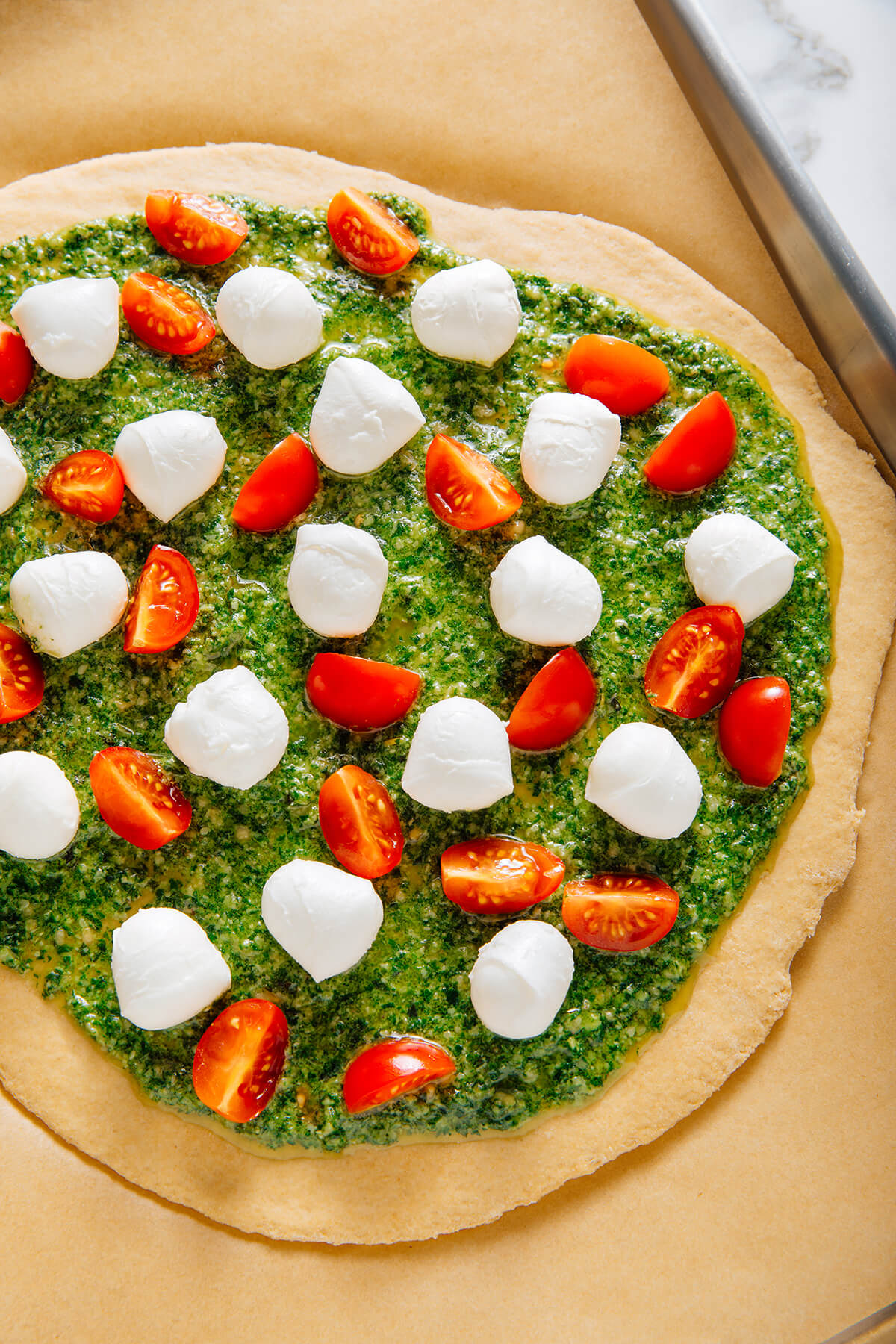 pesto pizza before baking