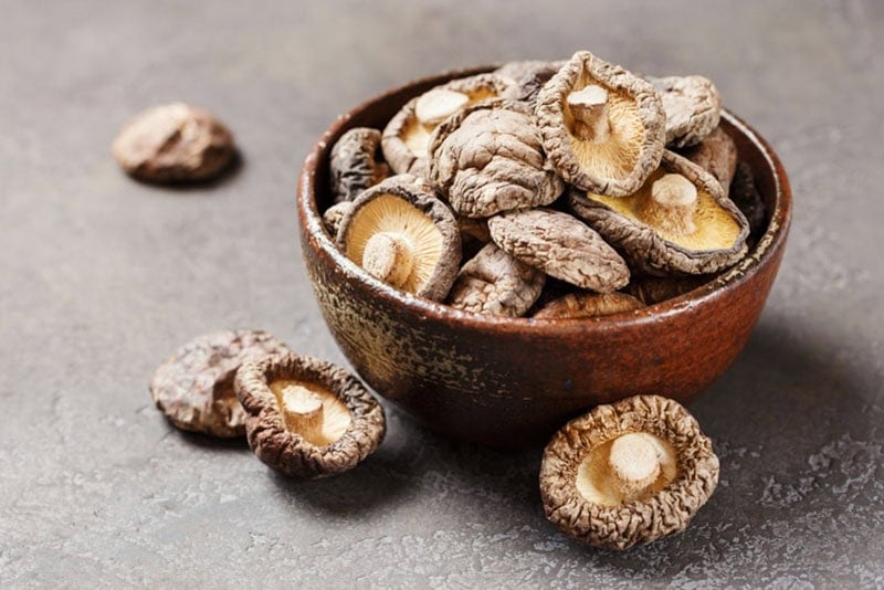 Dried Shiitake in a brown bowl.
