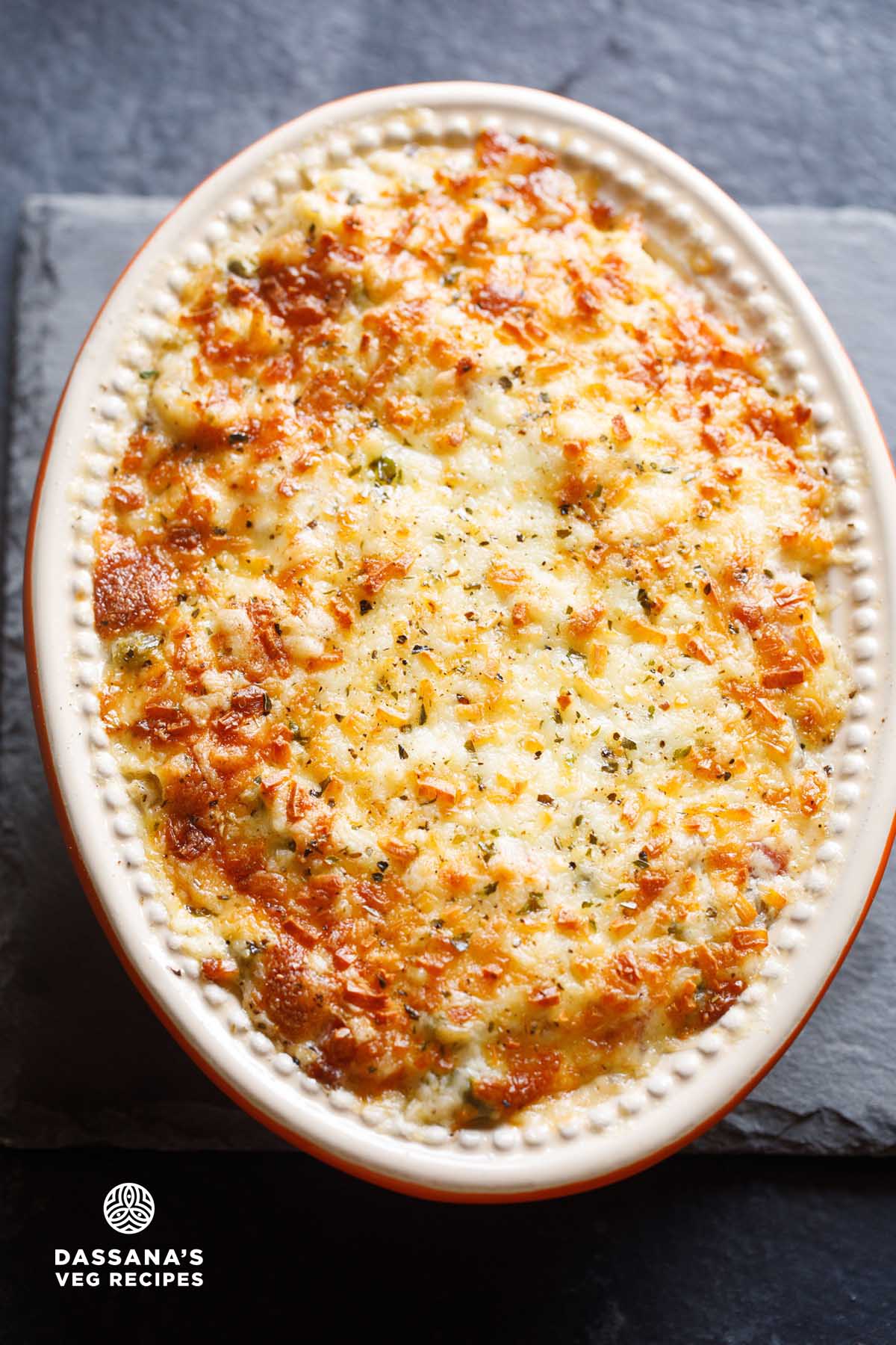 Baked vegetable au gratin in a baking dish.