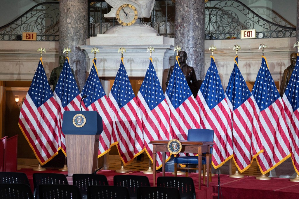 The stage prepared for President Donald Trump signing of the bipartisan Housing Bill is seen on the Capitol Wednesday, June 24, 2026, in Washington. (AP Photo/Jose Luis Magana)