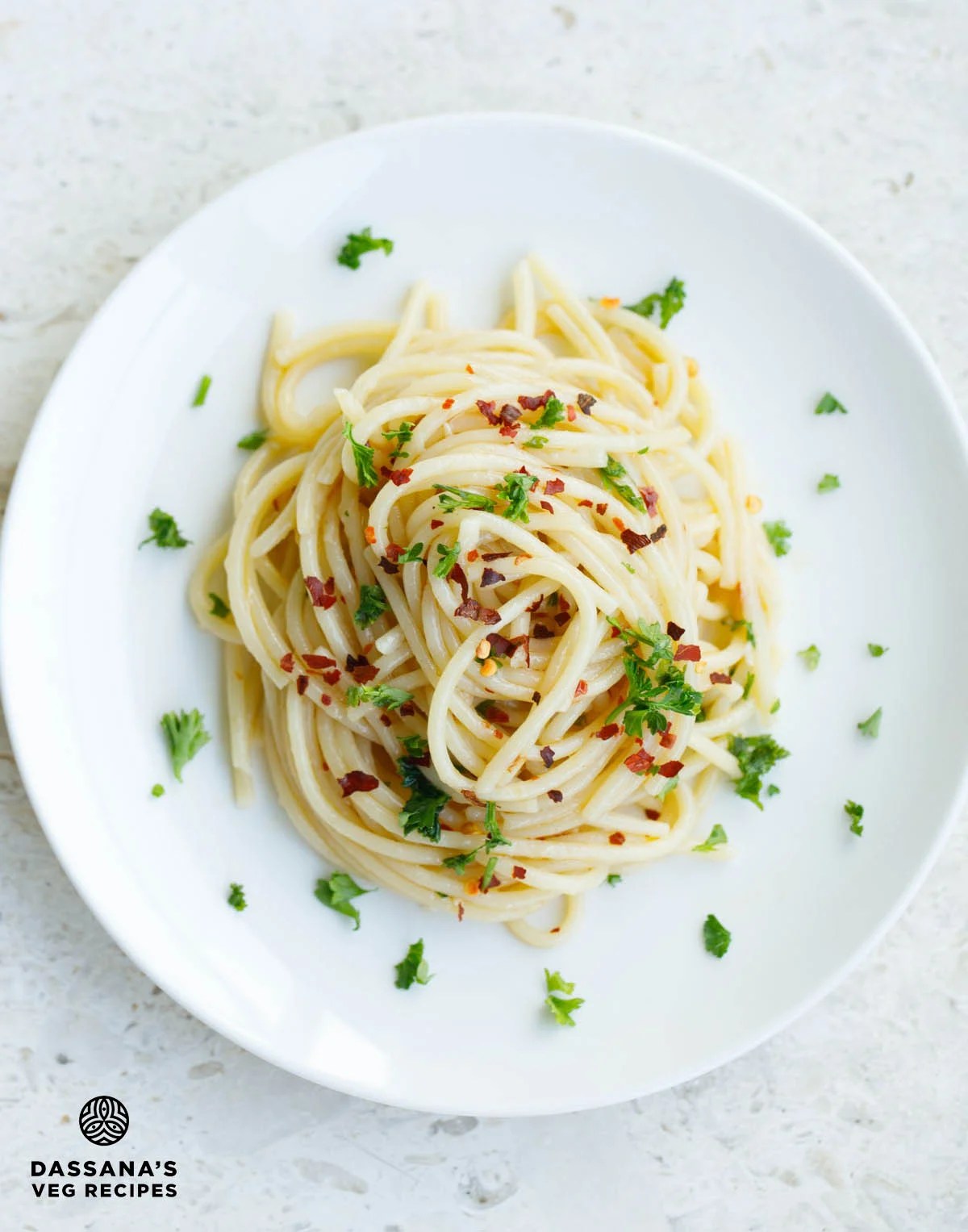Aglio e olio​ pasta with garlic, chili, and parsley
