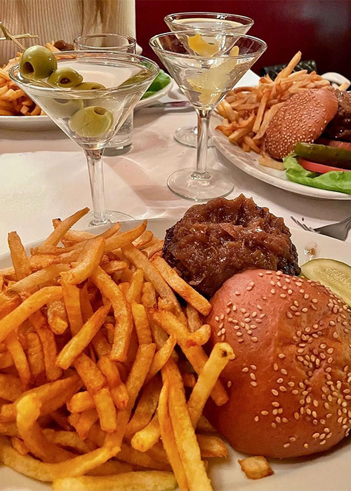 Minetta Tavern is one of the best places for a burger and a Martini in NYC.