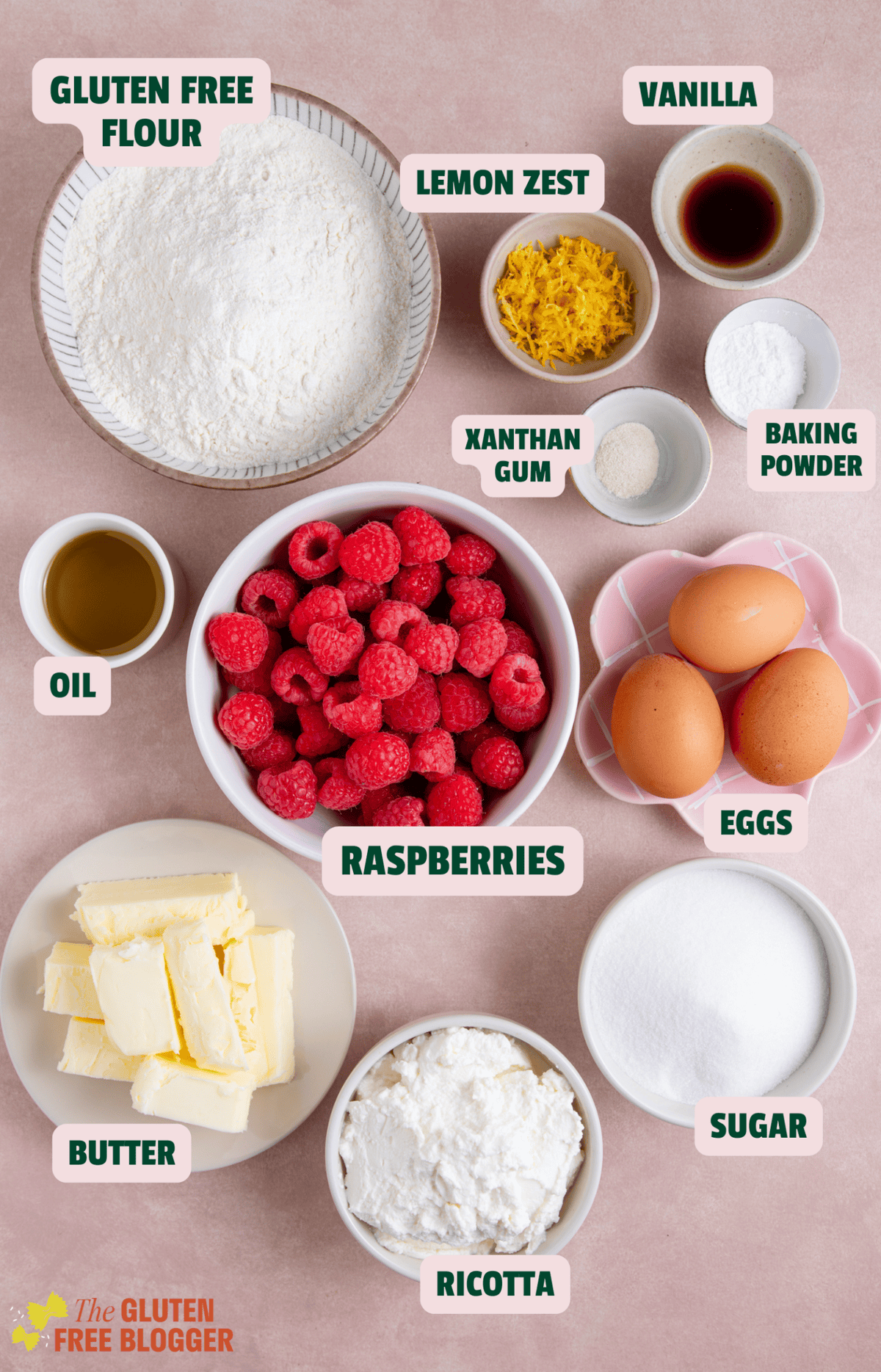 Ingredients for gluten free raspberry ricotta cake laid out with text labels.