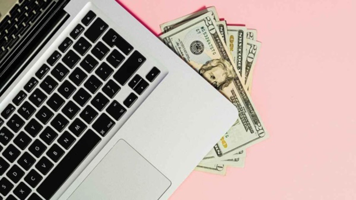 money and laptop