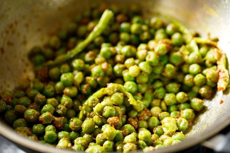 Matar mixed with ground spices.