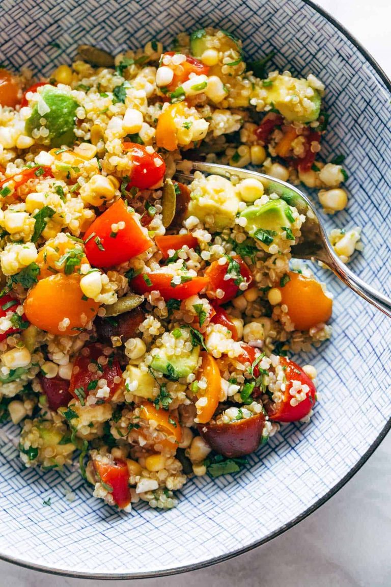 Quinoa salad with tomatoes, corn, and avocado.