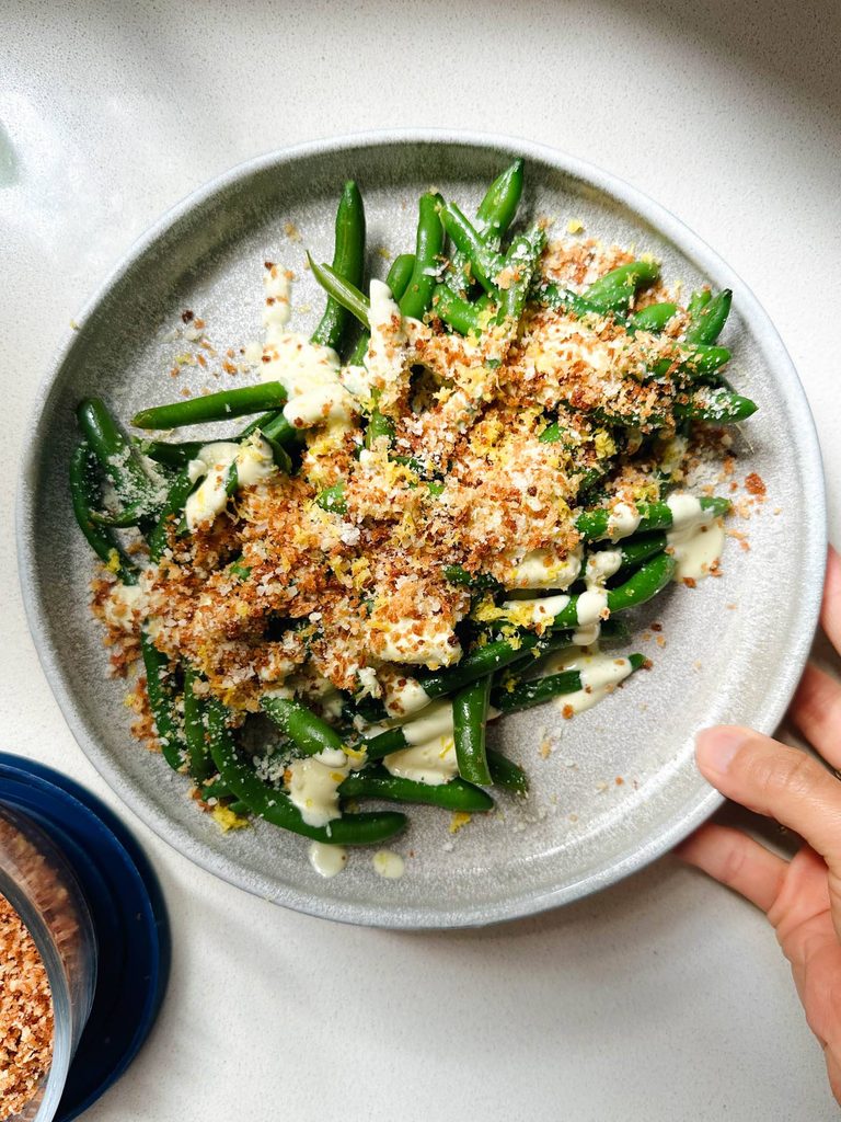 Greens beans with avocado caesar dressing.