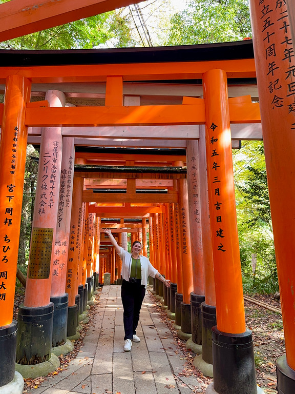 Amanda under torii gates at Fushimi Inari
