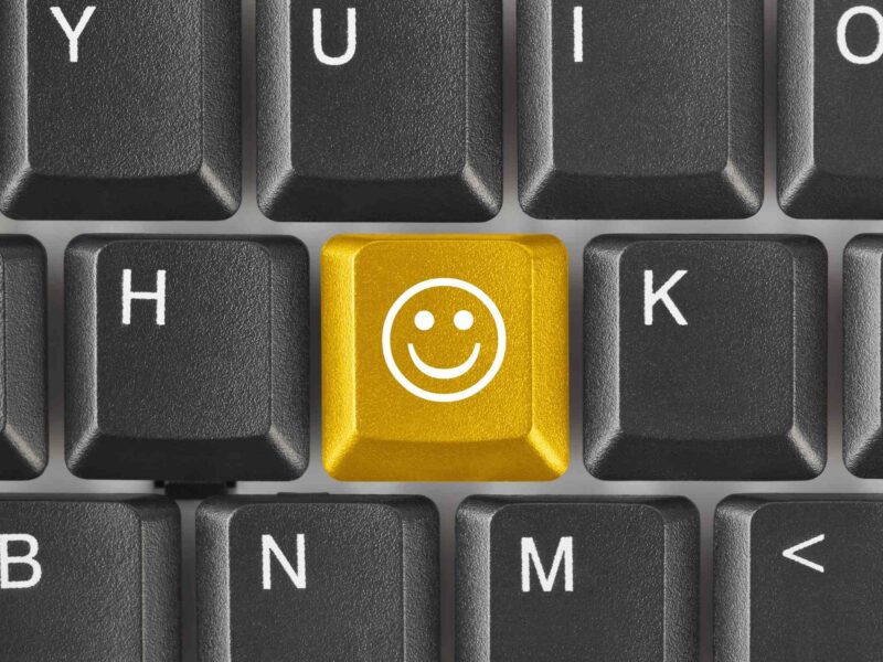 Computer keyboard with smile key in place of the J key