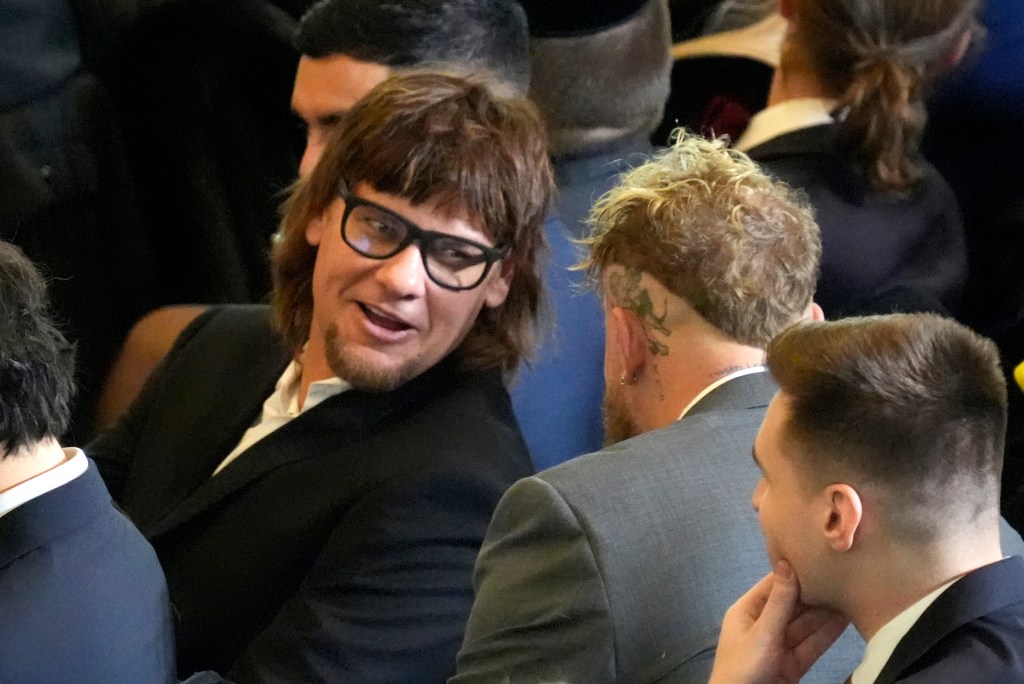 Theo Von, left speaks with Jake Paul in Emancipation Hall at the 60th Presidential Inauguration, Jan. 20, 2025, at the U.S. Capitol in Washington. (Jasper Colt/Pool Photo via AP, File)