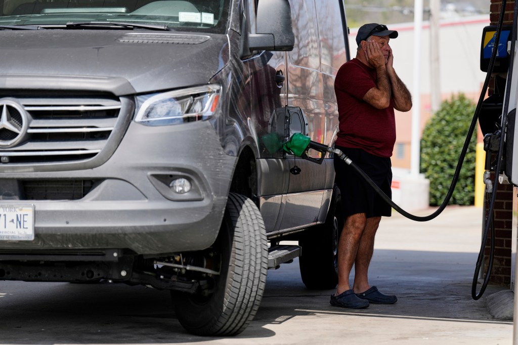 Ray Ruda fills his van with fuel at a gas station Wednesday, March 25, 2026, in Brentwood, Tennessee.