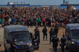 Spanish protesters and migrants clash with police in Ceuta