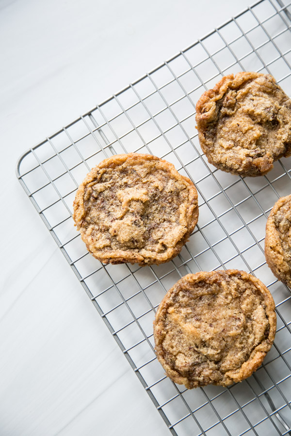 gluten-free chocolate chip cookies with coconut flour on a wire rack after baking