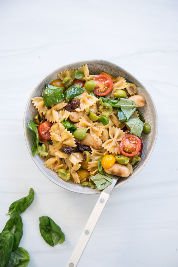 gluten-free dairy-free pasta salad in a bowl with spoon