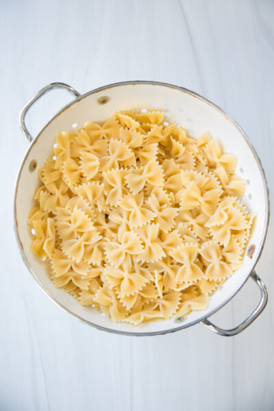 gluten-free bow tie farfalle pasta in a colander
