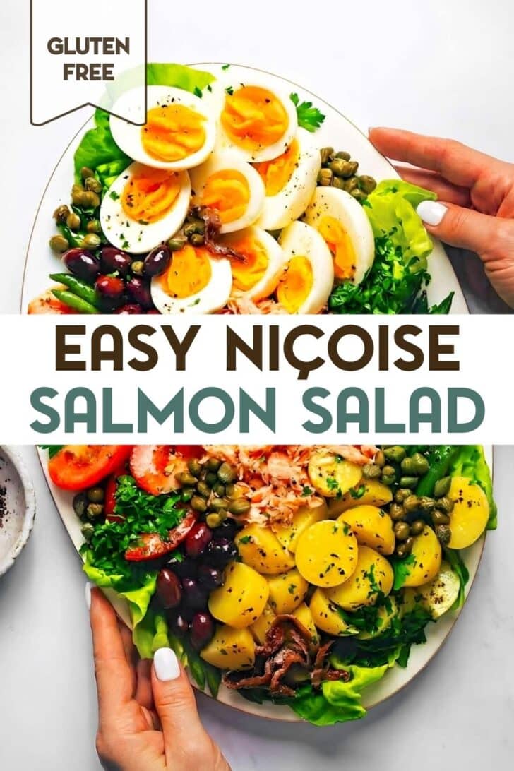 A woman's hands holding a salmon nicoise salad with salad greens, green beans, new potatoes, tomatoes, hard boiled eggs, olives, capers, salmon and herbs on an oval platter with a text overlay for Pinterest.