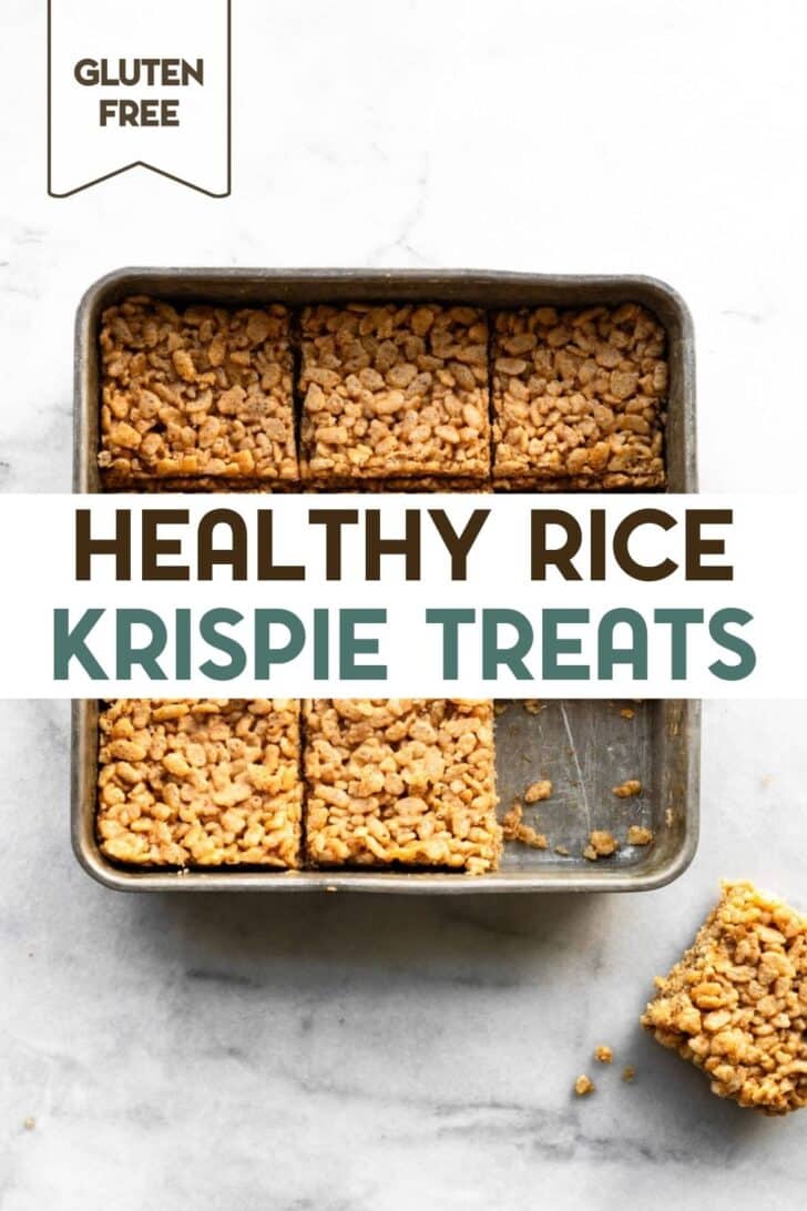 Homemade rice crispy bars pressed into a square baking cut into squares with one piece sitting out of the pan with a text overlay for Pinterest.