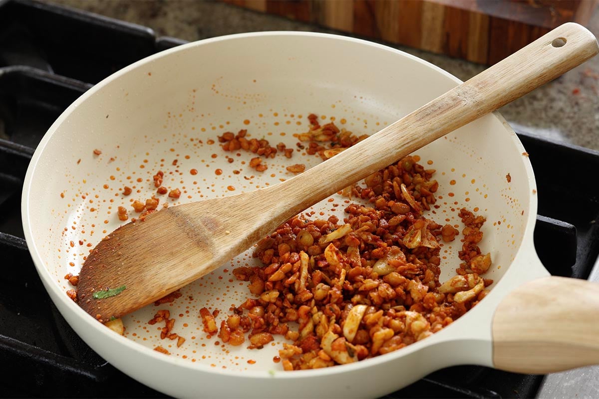 crispy chili lime tempeh after mixing in the lime zest and spices