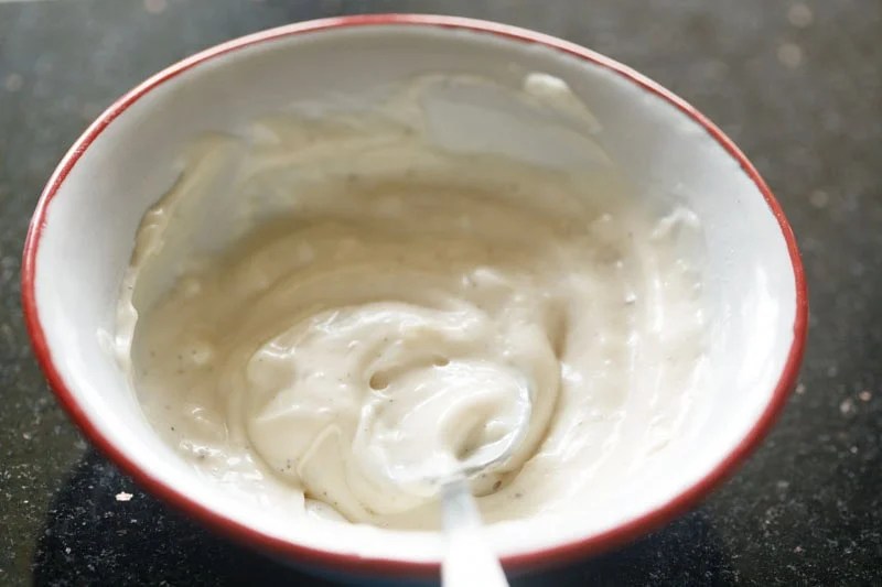Prepared garlic aioli sauce in bowl.