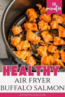 buffalo salmon in air fryer basket.