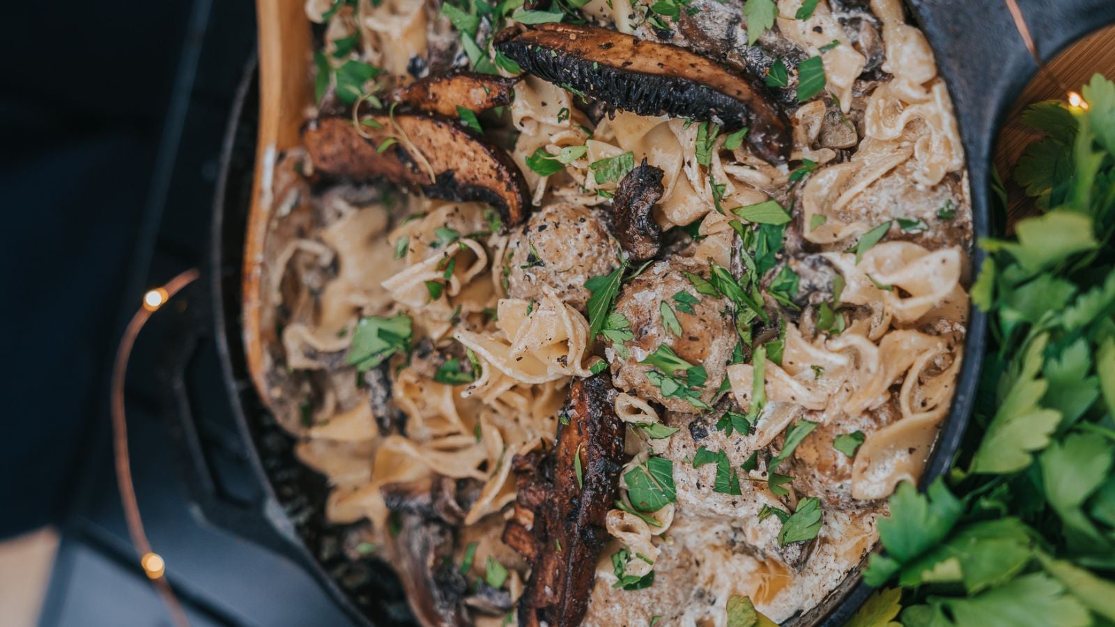 Meatball stroganoff cooked creamy with mushrooms and noodles.