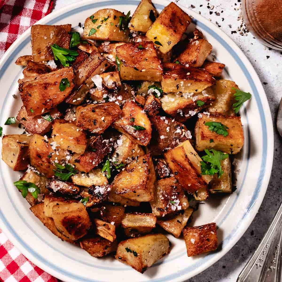 roasted russte potatoes with flaky sea salt and parsley and pepper