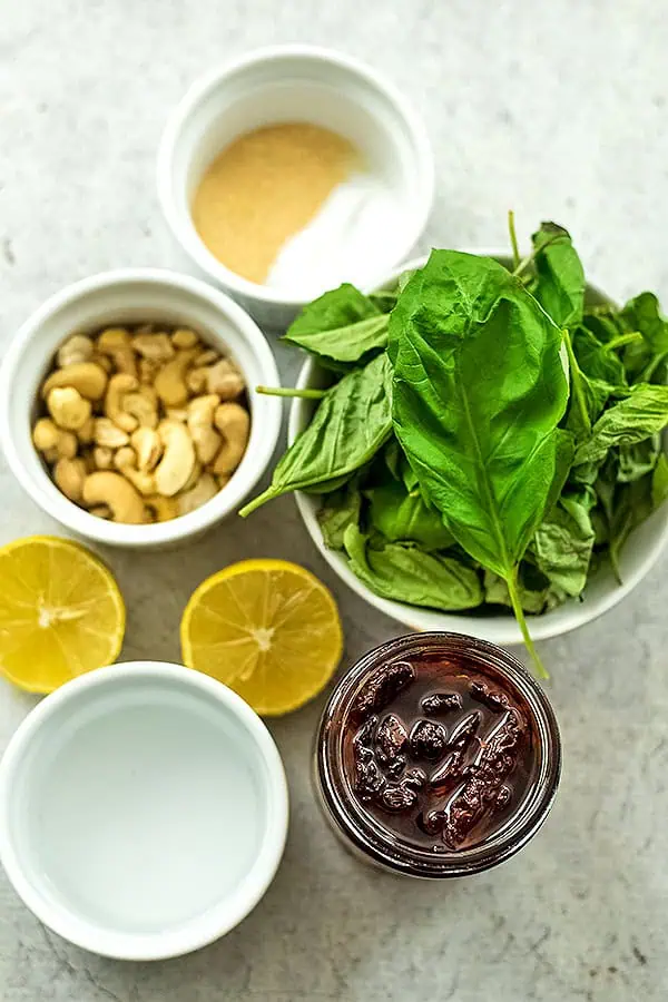 Ingredients to make sundried tomato pesto.
