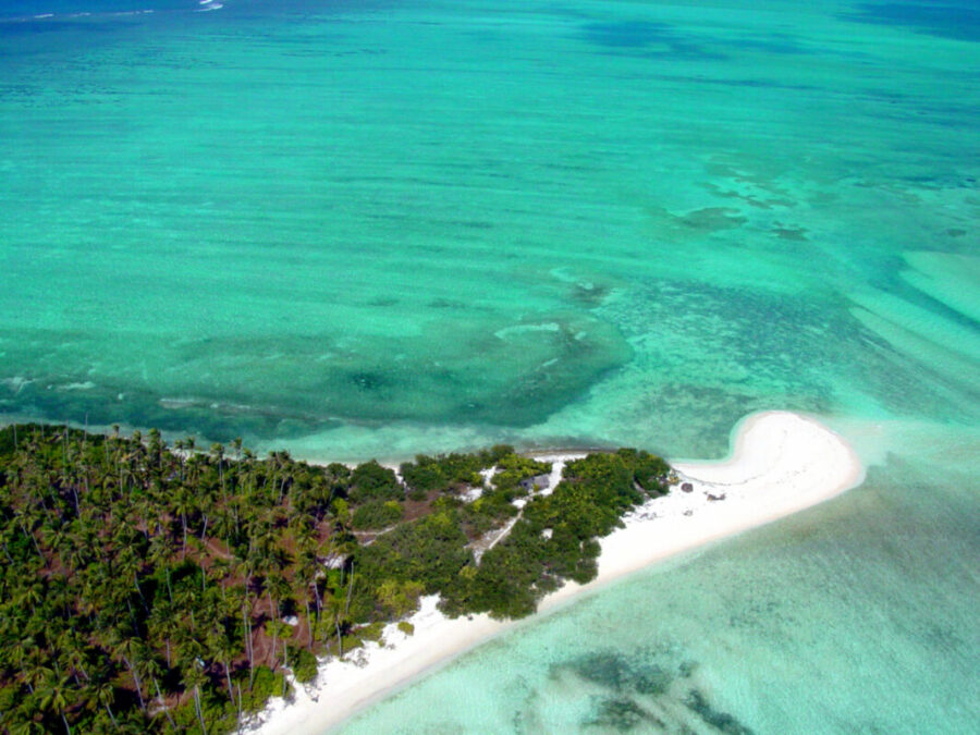 Aerial view of Kalpitti Islet with white sand and turquoise lagoon near Agatti