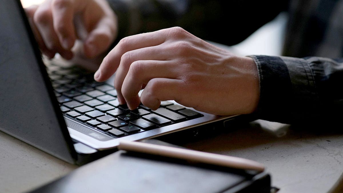 A man typing