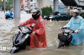 Bangkok roads submerged as flood disaster declared