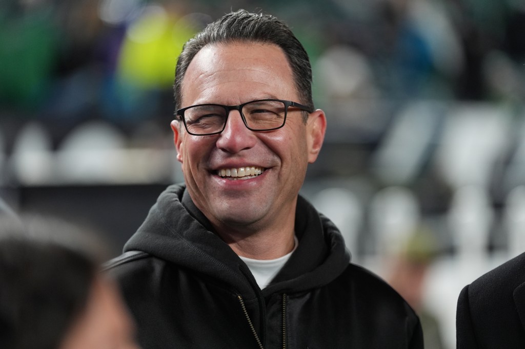 Pennsylvania Gov. Josh Shapiro watches warm ups before an NFL football game between the Philadelphia Eagles and the Detroit Lions on Sunday, Nov. 16, 2025, in Philadelphia. (AP Photo/Matt Slocum)
