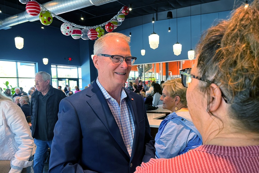 Adam Hamilton, a Methodist mega-church pastor from Kansas, talks to voters as he wraps up a U.S. Senate listening tour on Saturday, April 18, 2026, at Limitless Brewing in Lenexa, Kansas.