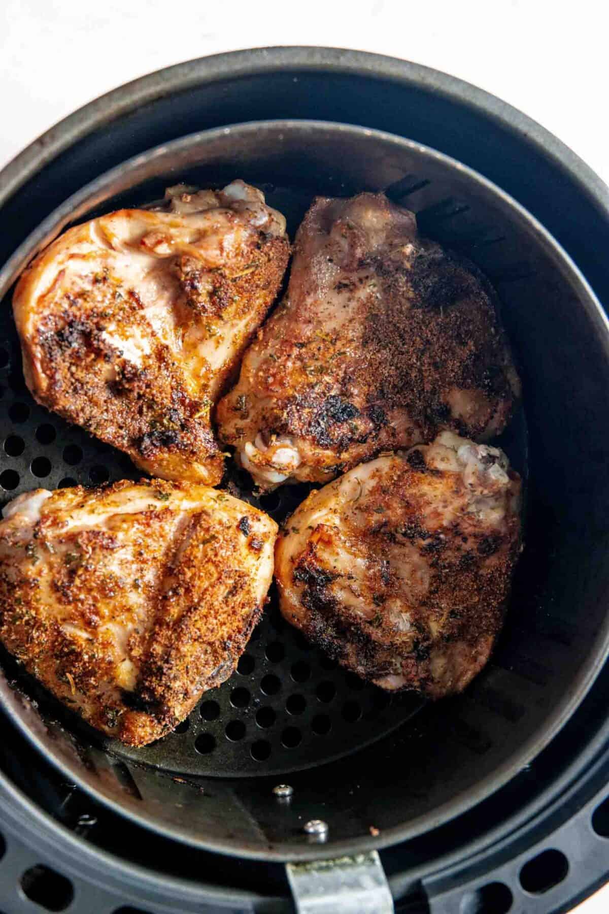 Golden brown thighs in the air fryer.