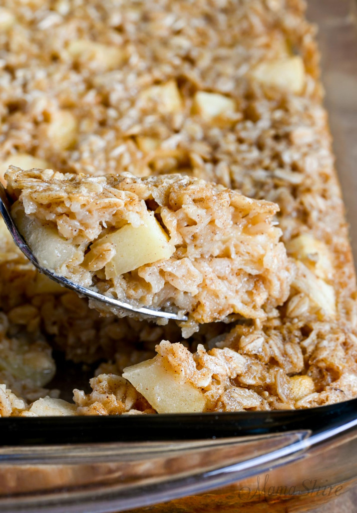 A closeup of a spoonful of apple cinnamon baked oatmeal.
