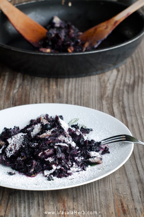 Kaiserschmarrn Recipe with Blueberries - Foolproof Easy Scratch Pancake Dessert from Austria dusted with powdered sugar. Makes a great one pot dessert after a long day at work. You can make this Kaiserschmarren too without blueberries, plain or add sme raisins or dried berries. www.masalaherb.com