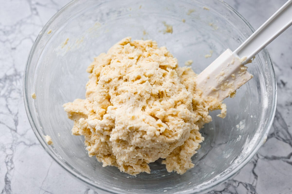 Milk added to the mixture to make the dumplings. 