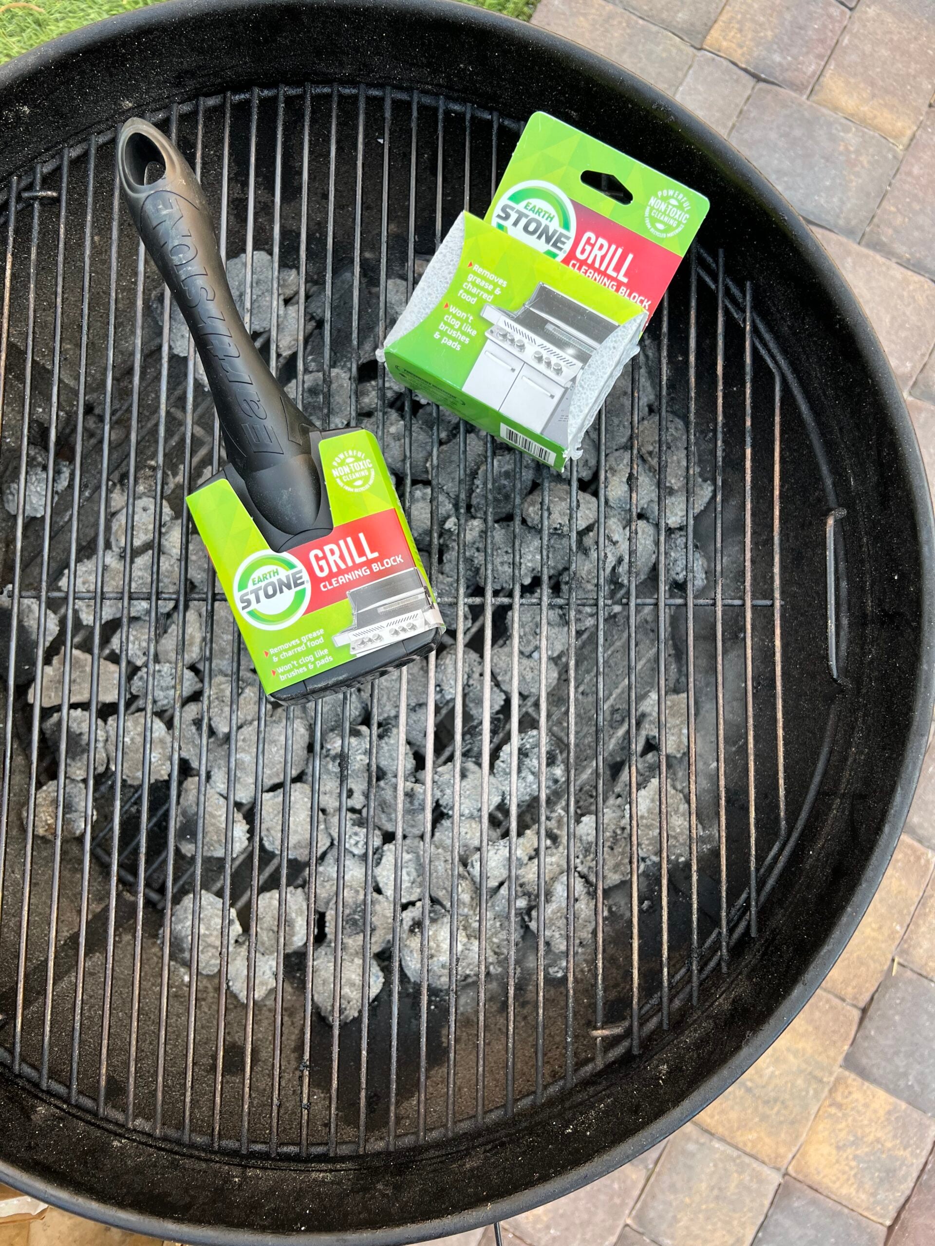 Cleaning stones on grill grate. 