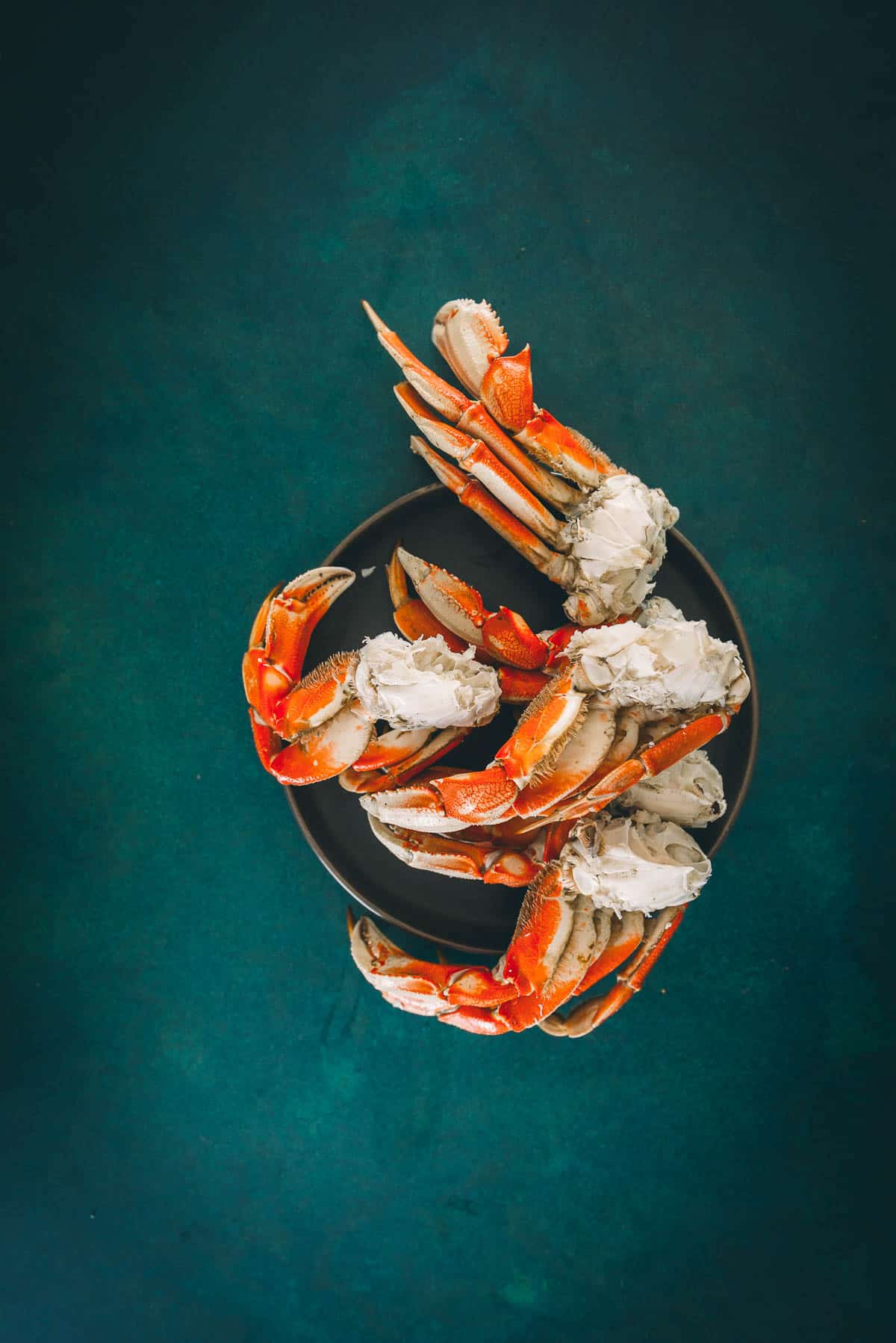 Crab legs, right out of the package to show color and that they are pre-cooked. 