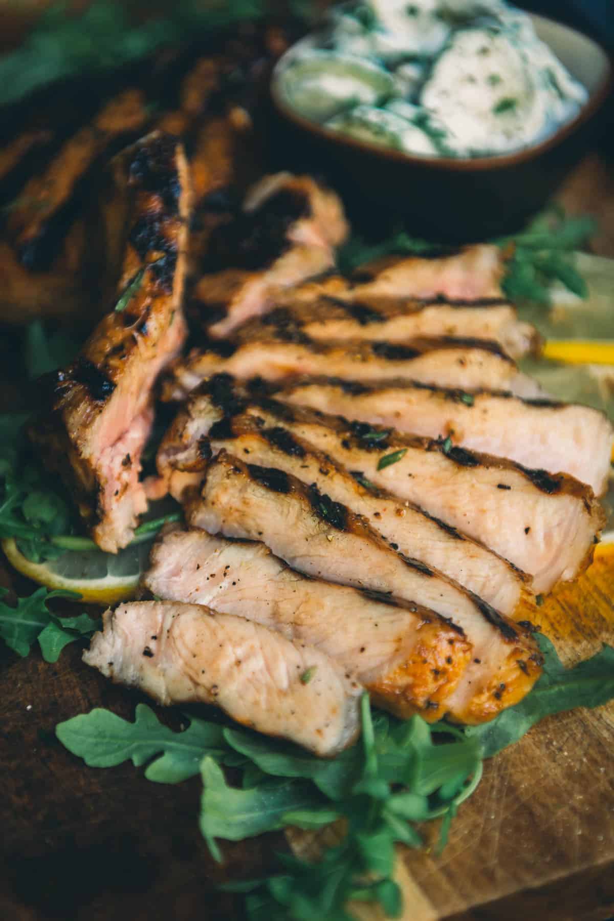 A juicy sliced grilled pork chop.