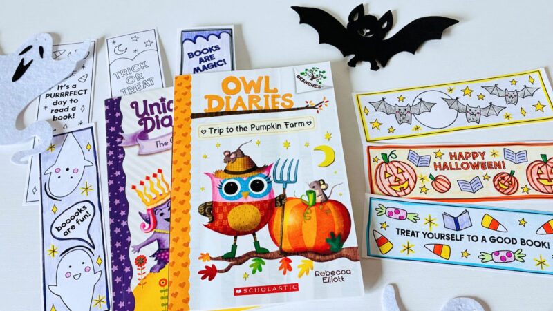 an image of books and printable Halloween bookmarks with Halloween decor